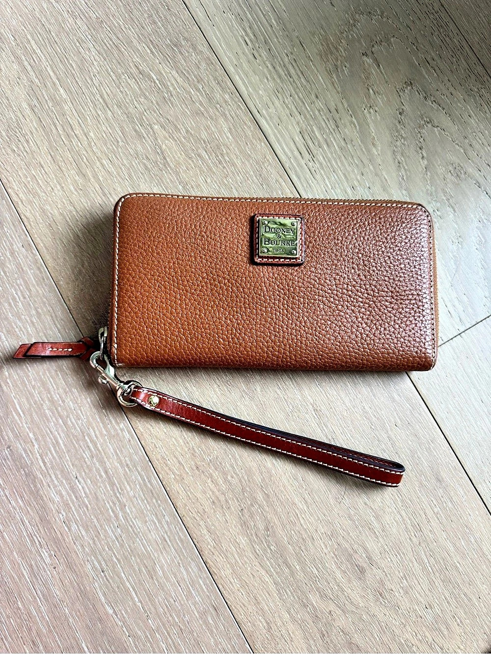 Dooney & Bourke Brown Pebbled Leather Zip Around Wristlet Wallet